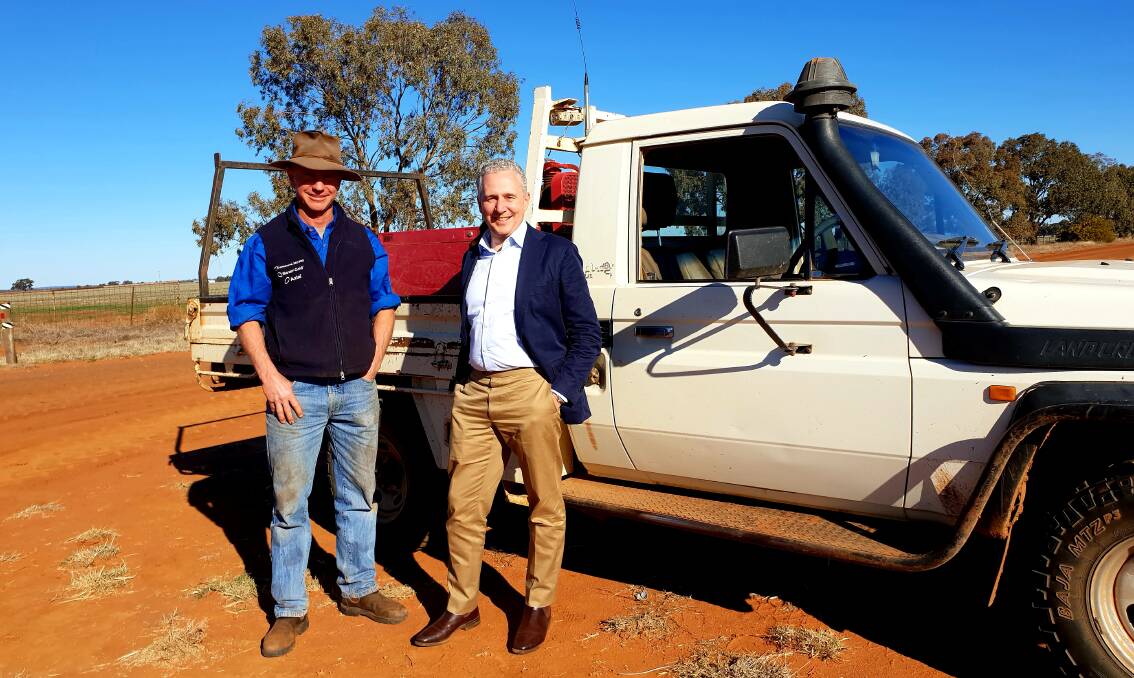 Helping out: Dubbo farmer Tom Harvey happy with the assistance offered by Telstra CEO Andy Penn.