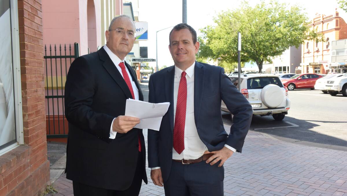Labor treasury spokesperson Walt Secord and Country Labor deputy mayor Stephen Lawrence disagree over a a call to ban pig dogging.