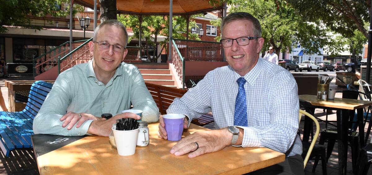 Federal Minister for Families and Social Services Paul Fletcher and Member for Parkes Mark Coulton discussing the NDIS in Dubbo last week. Photo: Belinda Soole.