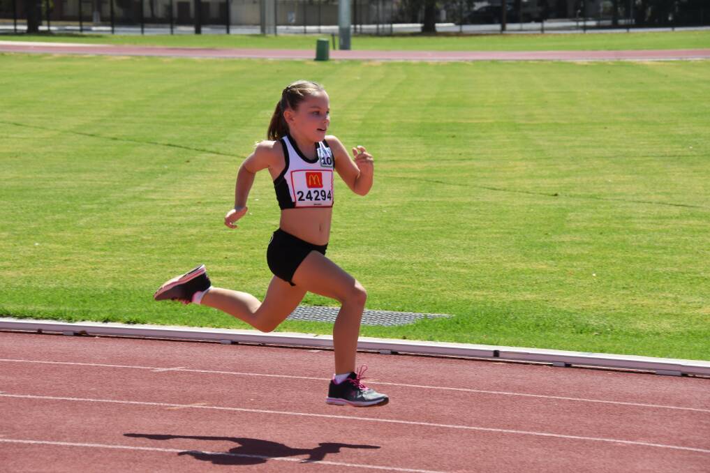 Striding out: Dubbo's Alyce Noke racing towards the finish line. Photo: AMY MCINTYRE.