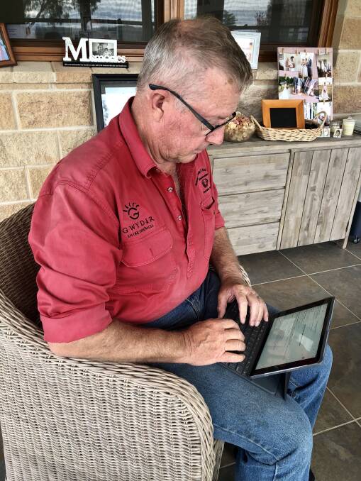 MAN AT WORK: Mark Coulton working from home on Monday. "I've got more energy than I've ever had before," he said.