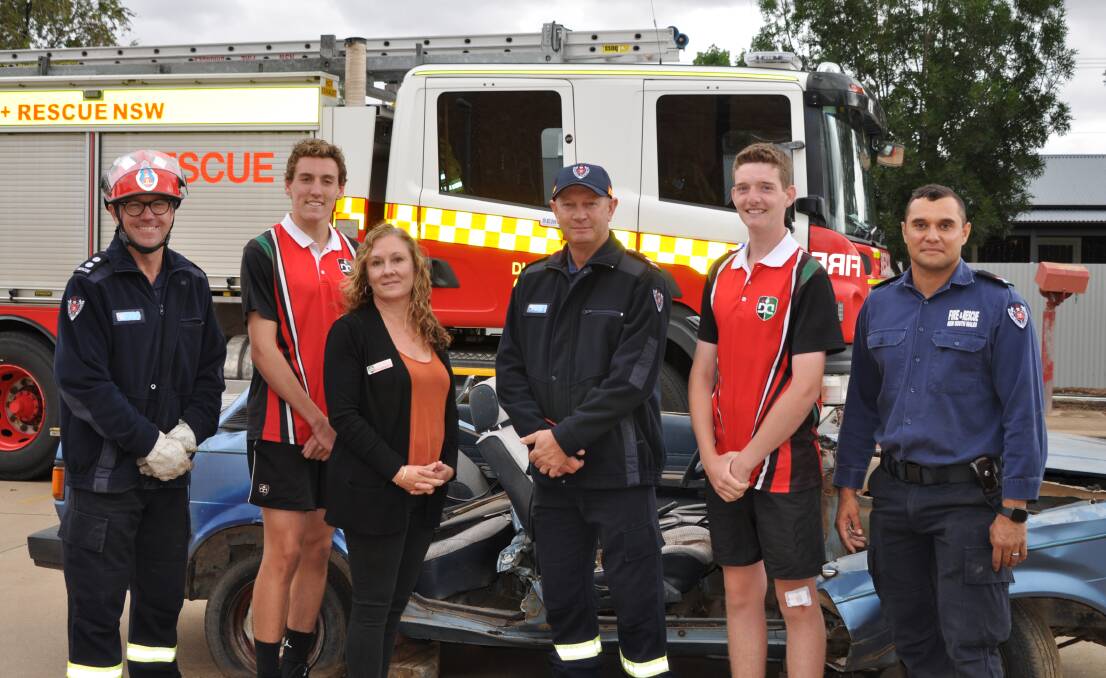 Road Safety: Fire and Rescue's Stephen Gilbert, Chris Cusack and Alex Frail with Hamish Wood, Riley Fish and Lisa Weber. Photo: Supplied.