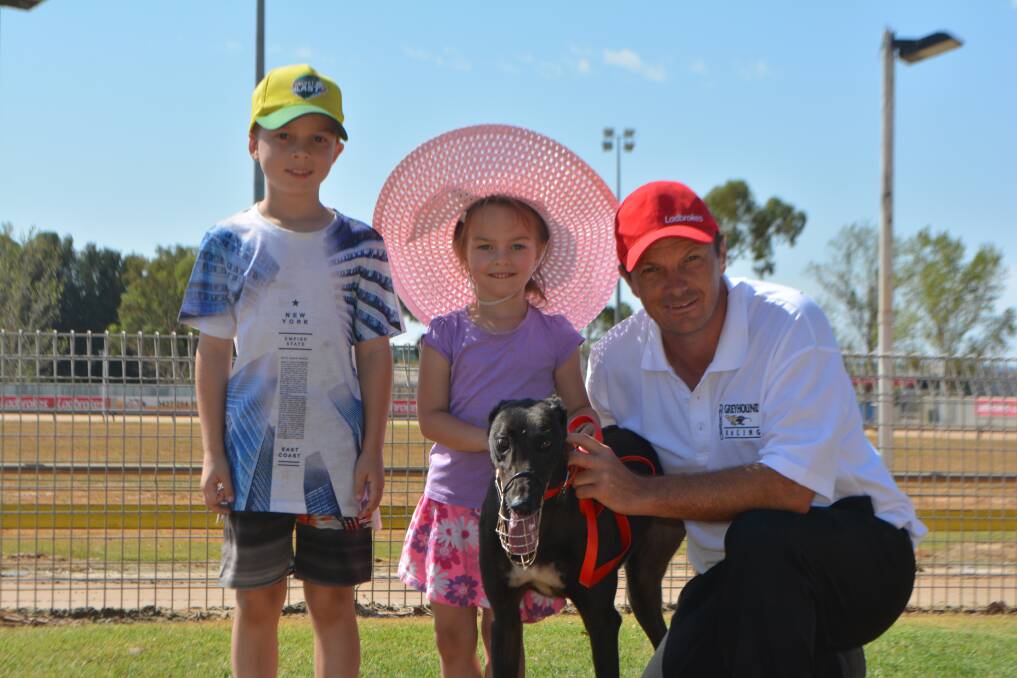 Family Affair: Richard Hawker (right) with Little Munchie and his assistant trainers Hayden and Elisha Hawker. Photo: CRAIG THOMSON.