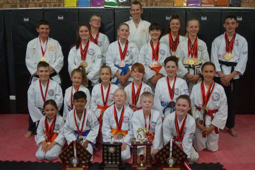 Team Kata Champions: Daniel Andersen (rear) with some of the members of the Dubbo Kumiai Ryu Martial Arts team. 