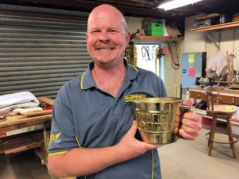 Smart Bloke: Dubbo’s Andrew Livingston won the ABC’s Hard Quiz and his men's shed mates are very proud of him. Photo: Craig Thomson.