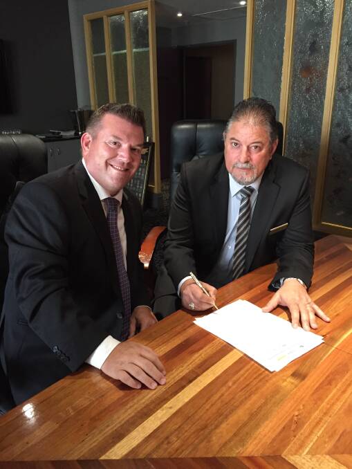 NO Support: Dugald Saunders, with Dubbo RSL Club Manager Gus Lico signing the MOU, but Clubs NSW said it does not endorse candidates from any political party. 