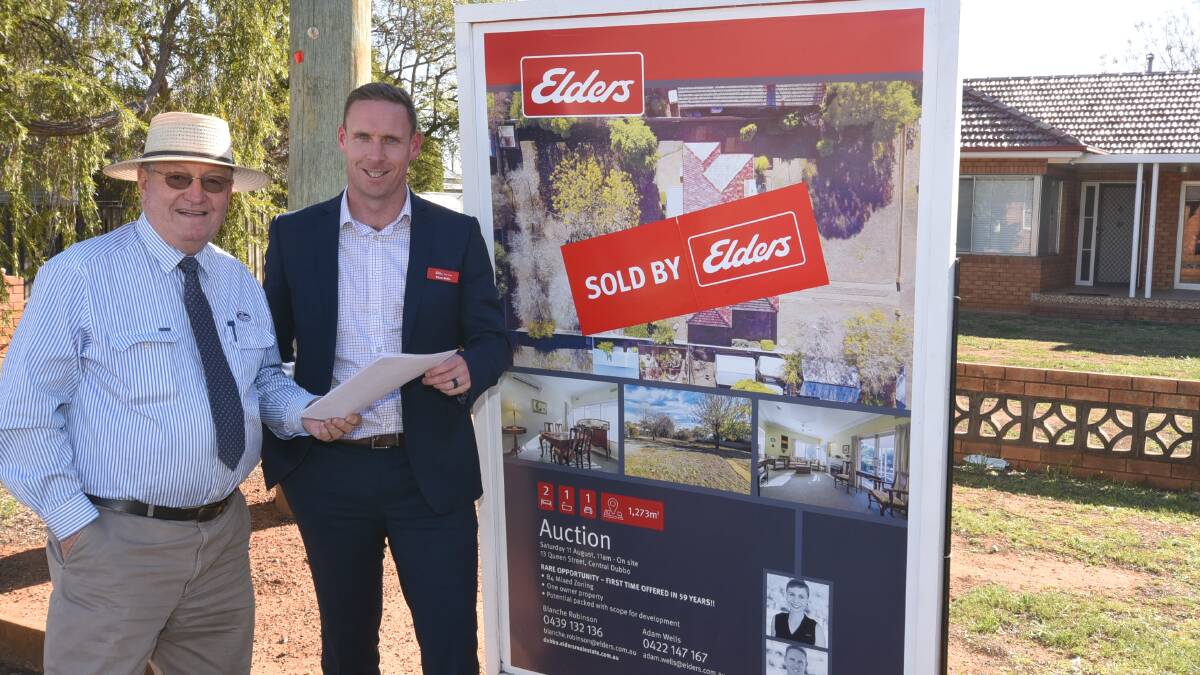 SOLD: Real estate agents Bob Berry and Adam Wells are happy with house prices in Dubbo. Photo: Belinda Soole. 