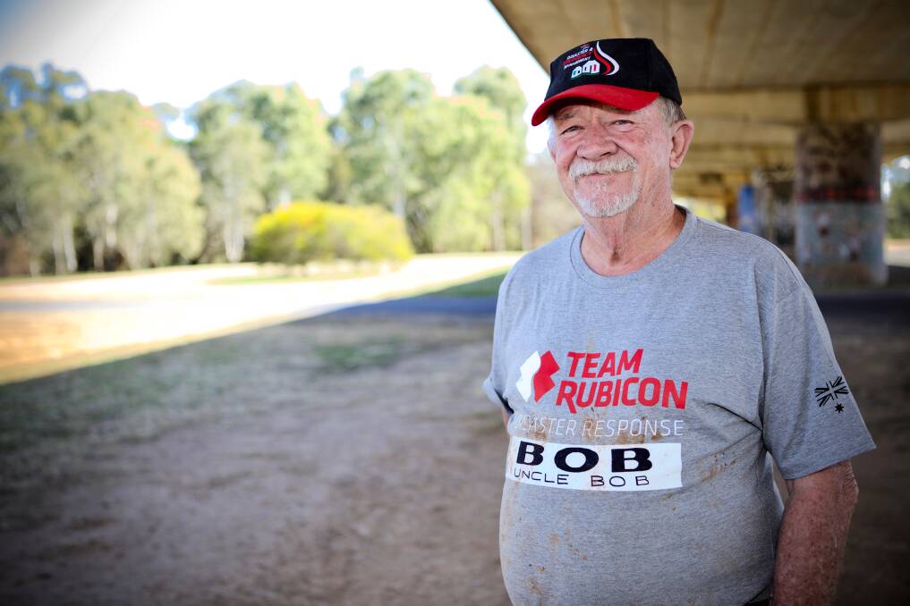 TEAMWORK: 'Uncle' Bob Roberson is part of the Team Rubicon crew that is helping farmers in our region. Photo: Brett Burriss.