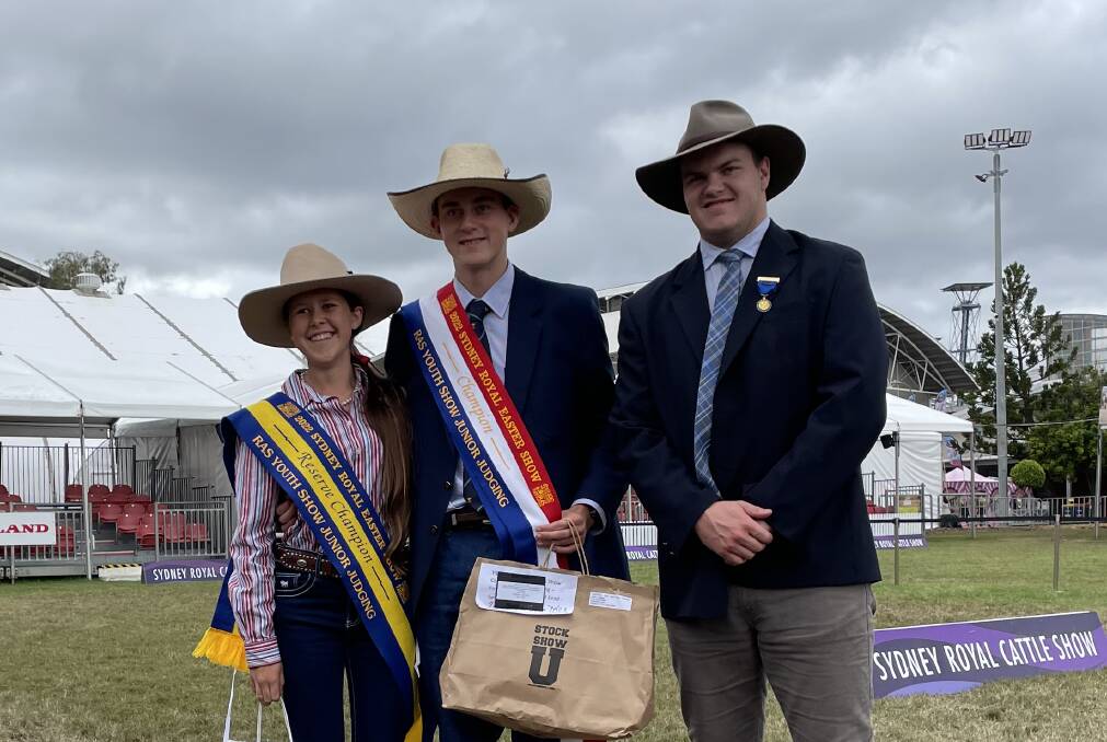 Champion RAS Youth Show junior judge Hugh Mitchell, and reserve ribbon winner Nicola Millar, both from Macquarie Anglican School at Dubbo, with over-judge Sam Bush from Cootamundra.