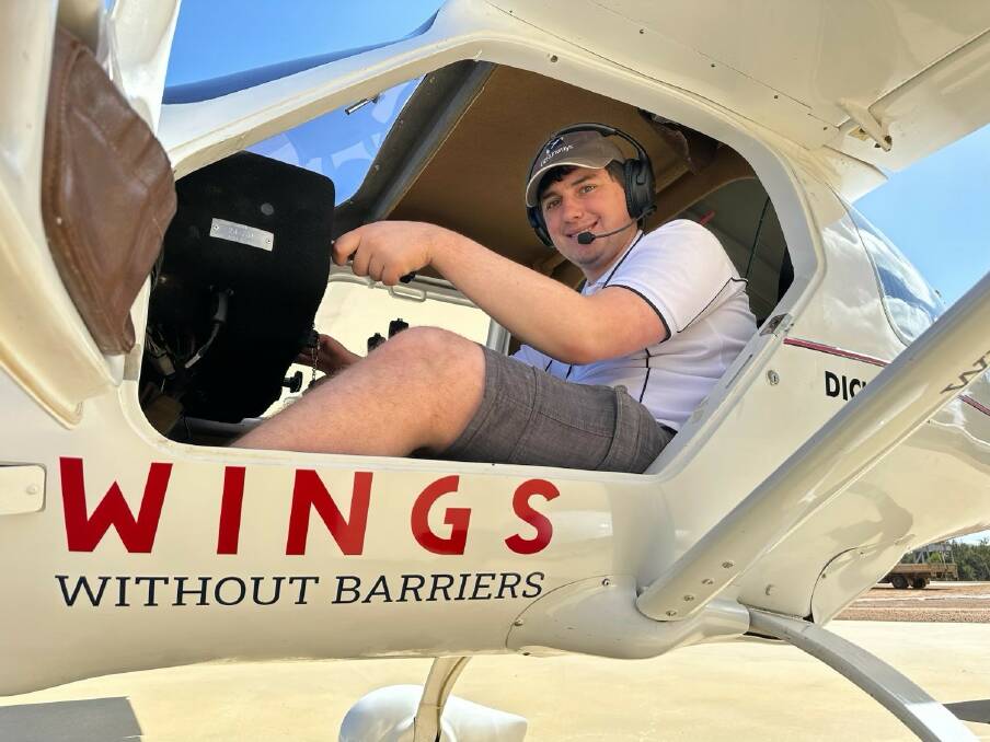 Hayden McDonald, an autistic pilot who created Wings Without Barriers, is pictured in his plane. Picture supplied