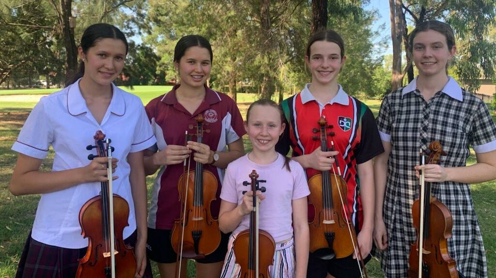 Dubbo members of the Overture Youth Orchestra Adele Bishop, Elke Bishop, Ruby Williams, Miranda Pfeiffer and Alexis Pfeiffer. Picture supplied