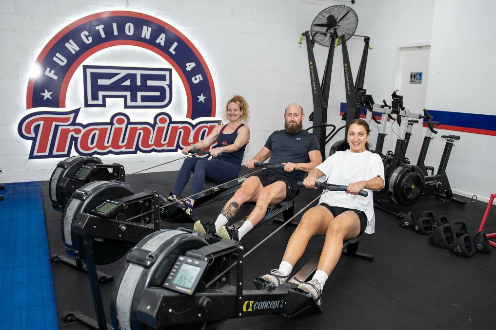 Naomi Grech, Jed Hardiman and Charnie Tuckey working out at F45 Training Dubbo. Picture by Belinda Soole