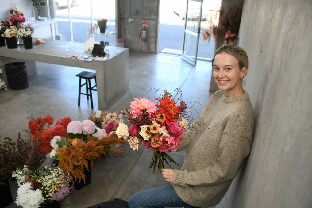 Abby Schofield, florist and owner of Once and Flor'al by Abby, likes finding quirky elements to put in her arrangements to make them a bit different. Picture by Amy McIntyre