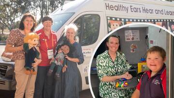 The Hear Our Heart Ear Bus team with their ear bus and puppets, Sam and Lucy, and (inset) Gemma Savage, visiting audiologist, checks a child's ears. Picture supplied