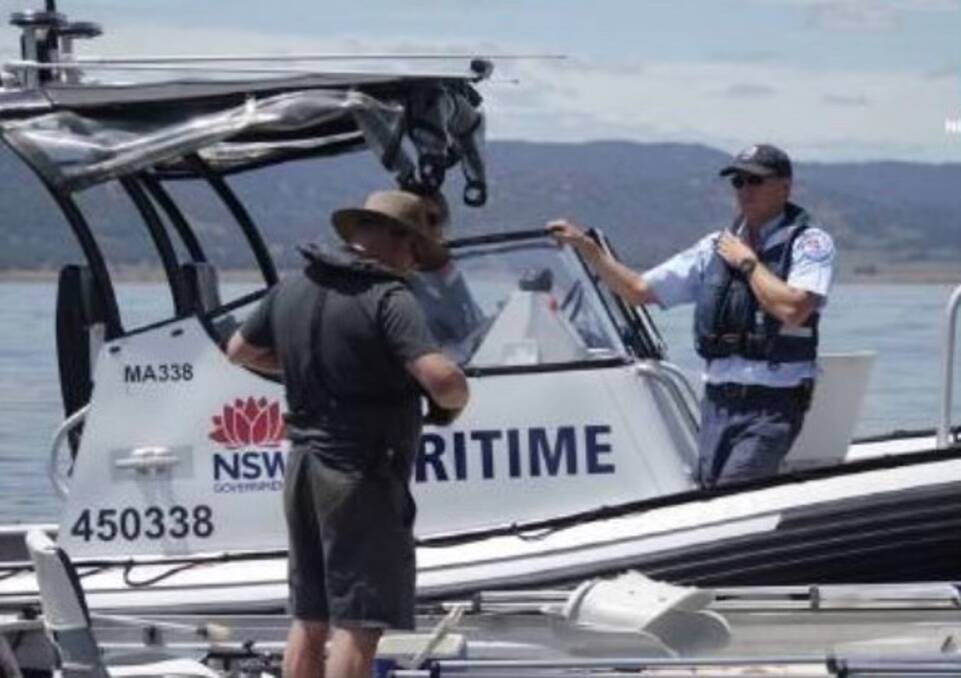 Boating Safety Officer Steve Cribb on Lake Burrendong undertaking a vessel safety check. Picture by NSW Maritime