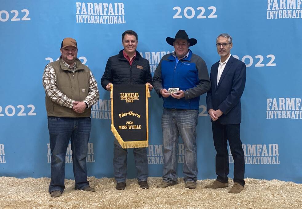 Pj Budler presenting Shorthorn Miss World to Nicholas Job (in blue, third from left) of Royalla Shorthorn Stud, in Canada in November 2022. The Job family also won Shorthorn Miss World in 2016. Picture supplied