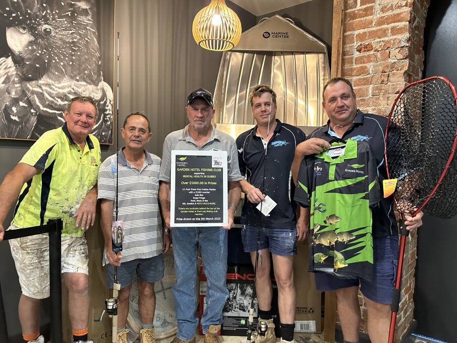 The Garden Hotel Fishing Club members Ross Harris, Freddy May, club president Alan Herbert, Jacob Parker and Rob Powyer, are selling tickets to a major raffle for Tradies in Sight, to support men's mental health. Picture supplied