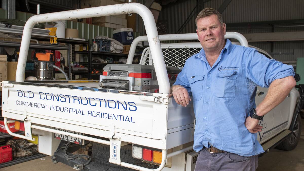Rob Lister of BLD Constructions stands next to his utility vehicle. Picture by Belinda Soole