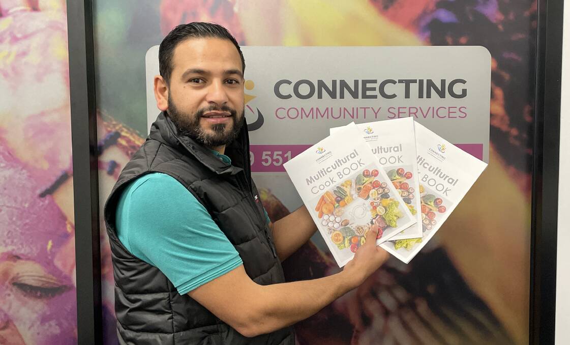 Connecting Community Services migrant support officer Khaled Taleb said the Multicultural Cookbook is a way to learn about other cultures through food. Picture by Nick Guthrie