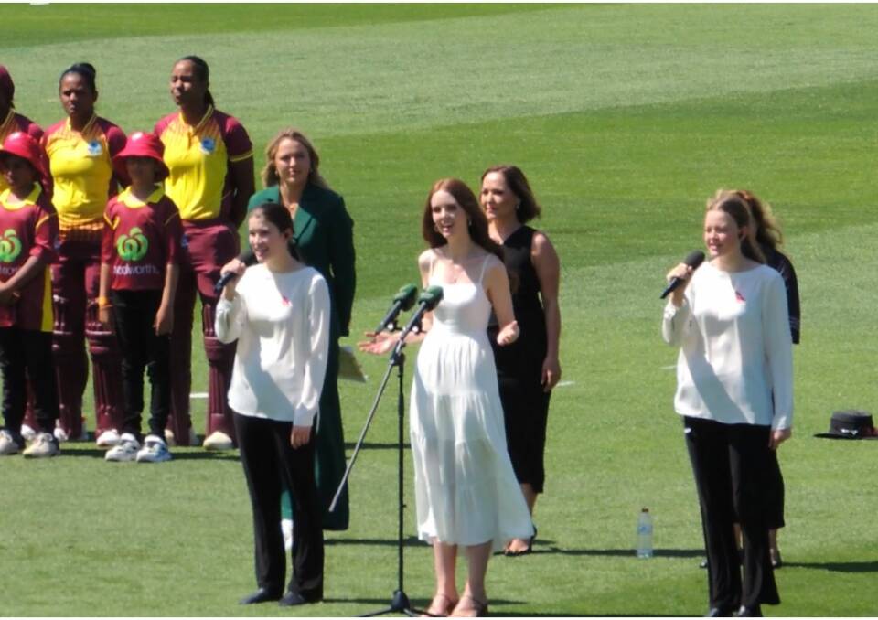 Grace Fuller sings the Australian National Anthem at the Australia versus West Indies, women's T20Is cricket match, on Sunday, October 1. Picture supplied
