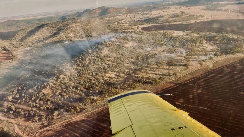 UNDER CONTROL: An aerial view of a bush fire near Condobolin, which firefighters patrolled overnight on Monday. Photo: NSWRFS/FRED FAHY AERIAL SERVICES