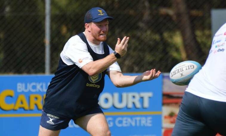 TRANSITION: Mark Baldwin throws a pass at Central West training last year. He's switched from player to coach ahead of the New Zealand tour. Photo: MATT FINDLAY