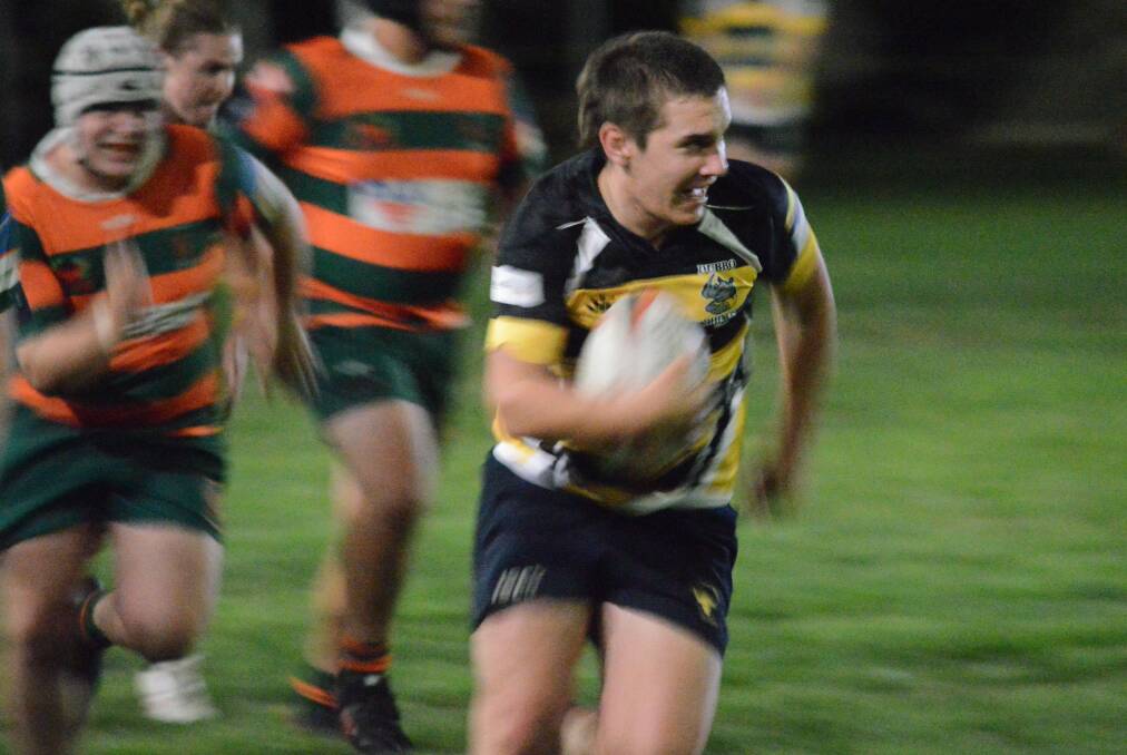 TRY TIME: Dubbo Rhinos' Rhys Martin sprints away to score the second of his second-half double at Pride Park on Friday night. Photo: MATT FINDLAY
