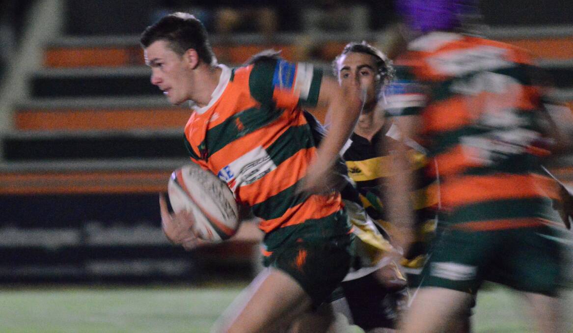 ON THE CHARGE: Orange City fullback Tye Pollack finds space in his side's thrilling, season-opening victory over the Dubbo Rhinos on Friday night. Photo: MATT FINDLAY