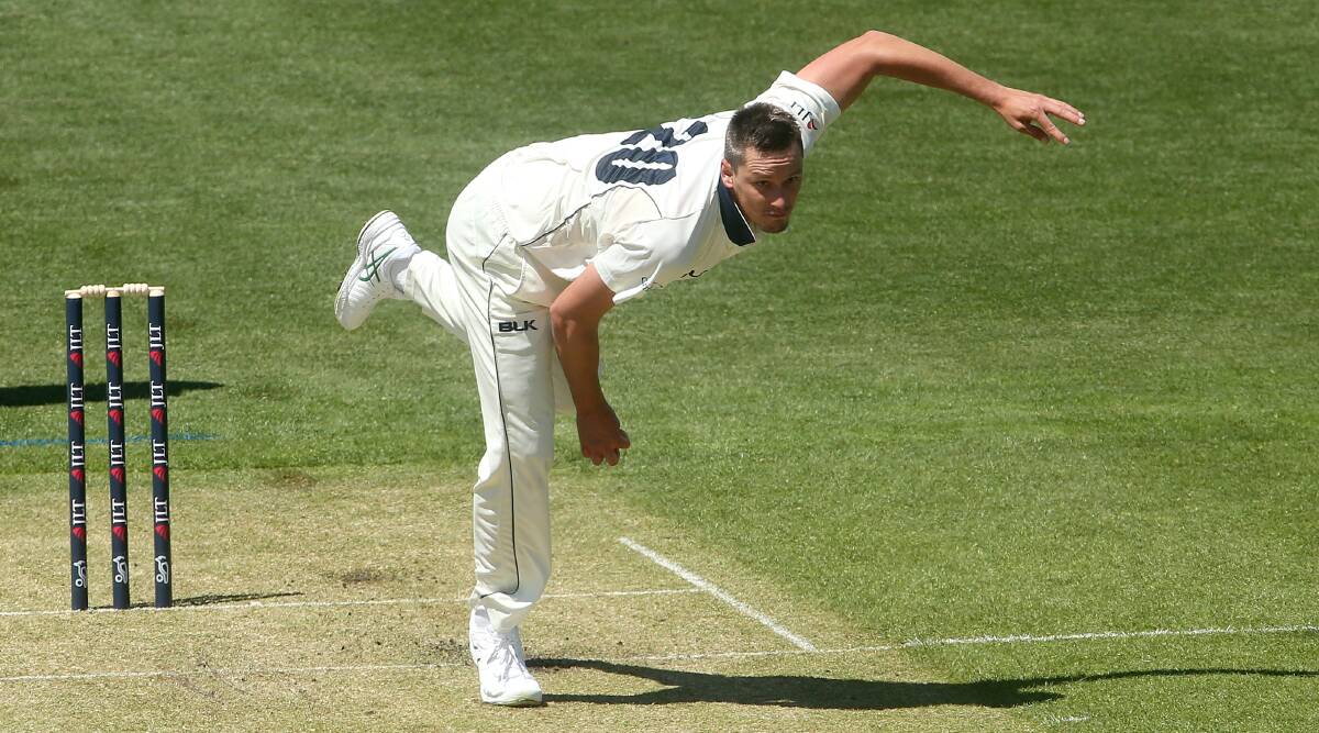 UNBEATEN: Chris Tremain sends one down during Victoria's win over Tasmania, which keeps the Bushrangers on top of the table. Photo: AAP IMAGE/HAMISH BLAIR