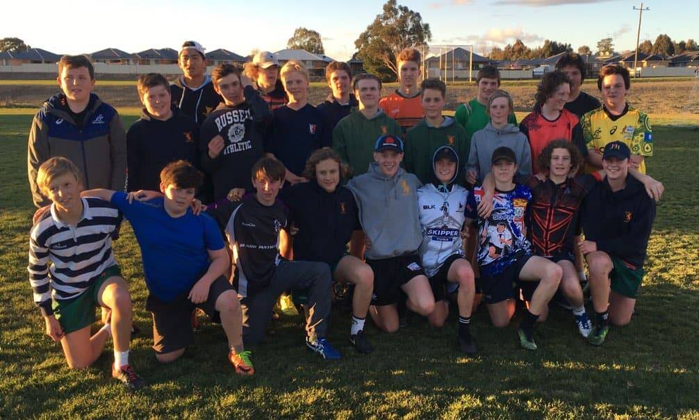A GREAT GROUP: Orange City's under 15s, all smiles before a brutal contact session that has them primed for the decider. Photo: GEORGE CONNAUGHTON