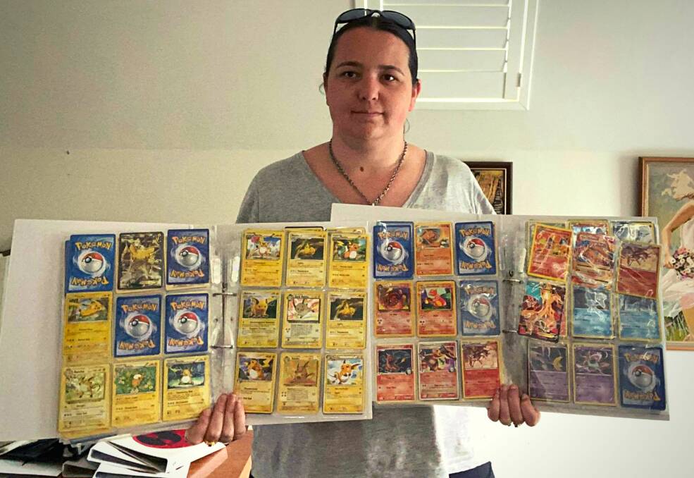 POKÉ-MANIA: Tegan Perry has kept her Pokémon card collection in good condition, a key in how valuable they are. Photo: CONTRIBUTED