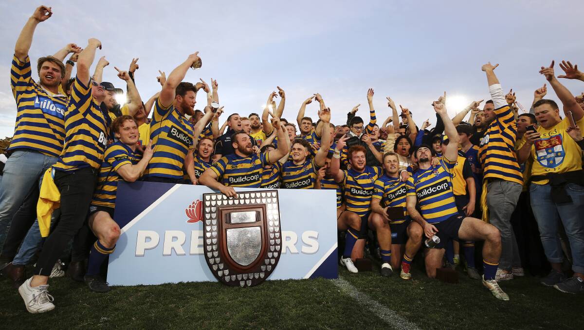 CHAMPIONS: Sydney University celebrates last year's Intrust Super Shute Shield premiership win. Photo: KAREN WATSON