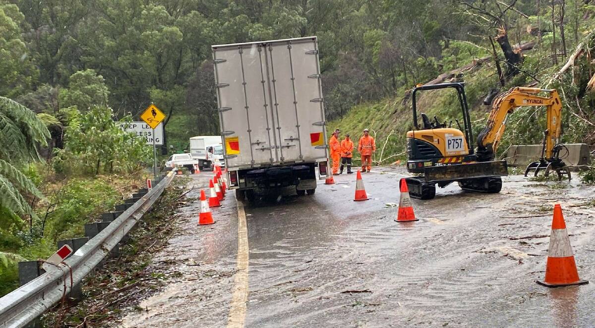 CLEAN-UP: Crews work on the Bells Line of Road late last month, the route is set to partly re-open later this week. Photo: HAWKESBURY CITY COUNCIL