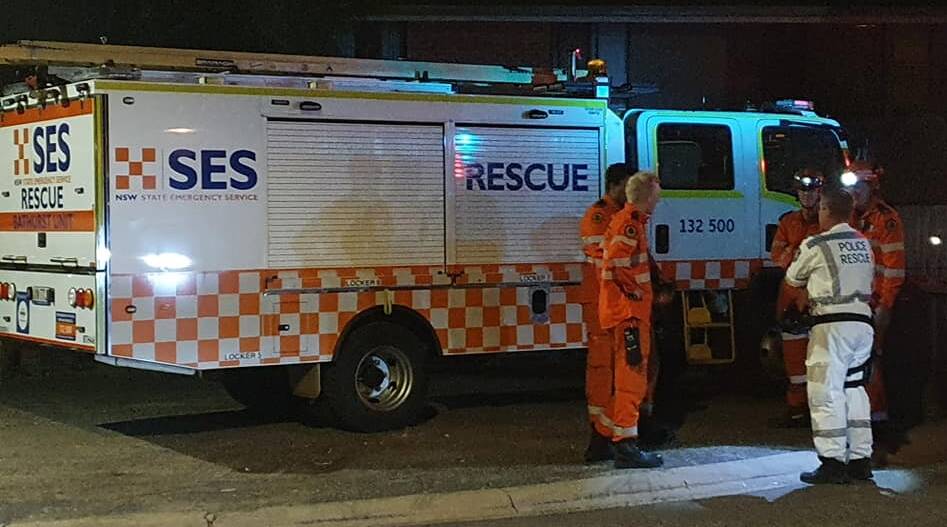 PAW-SOME JOB: SES and Police Rescue crews were on site to help rescue a trapped dog on Sunday night. Photo: FIRE AND RESCUE NSW