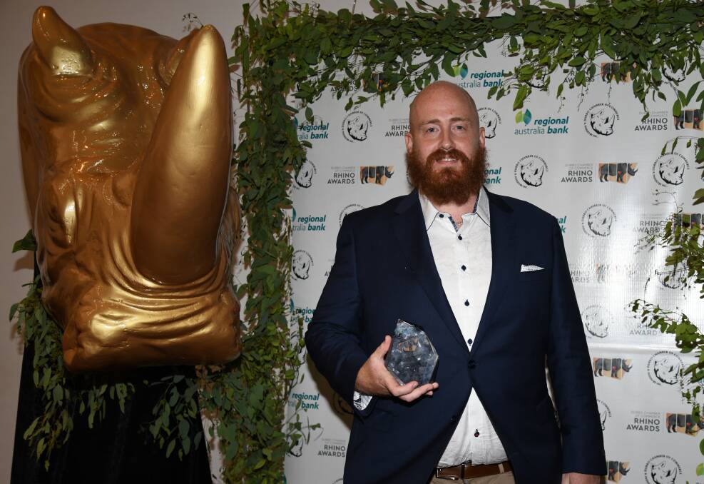 Double win: Summit Cranes director Joshua Shields with one of the two Rhinos trophies the business won at the awards. Picture: AMY MCINTYRE