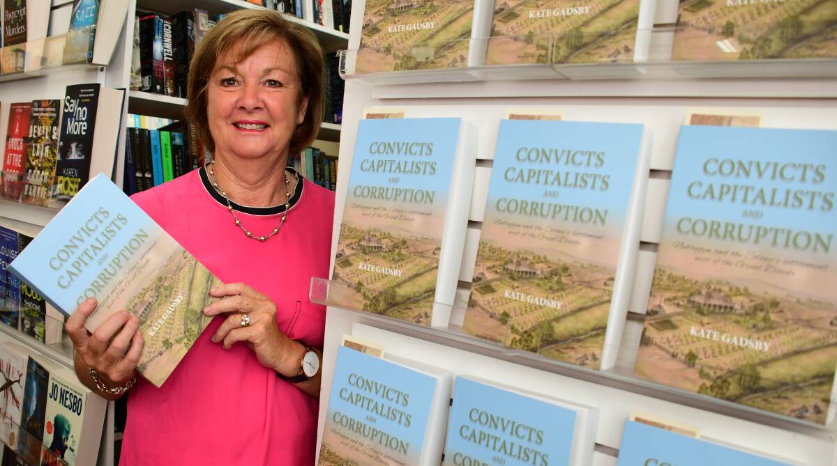 ON SHELF NOW: Self-published author Kate Gadsby with a copy of Convicts Capitalists and Corruption at the Book Connection. Photo: BELINDA SOOLE. 