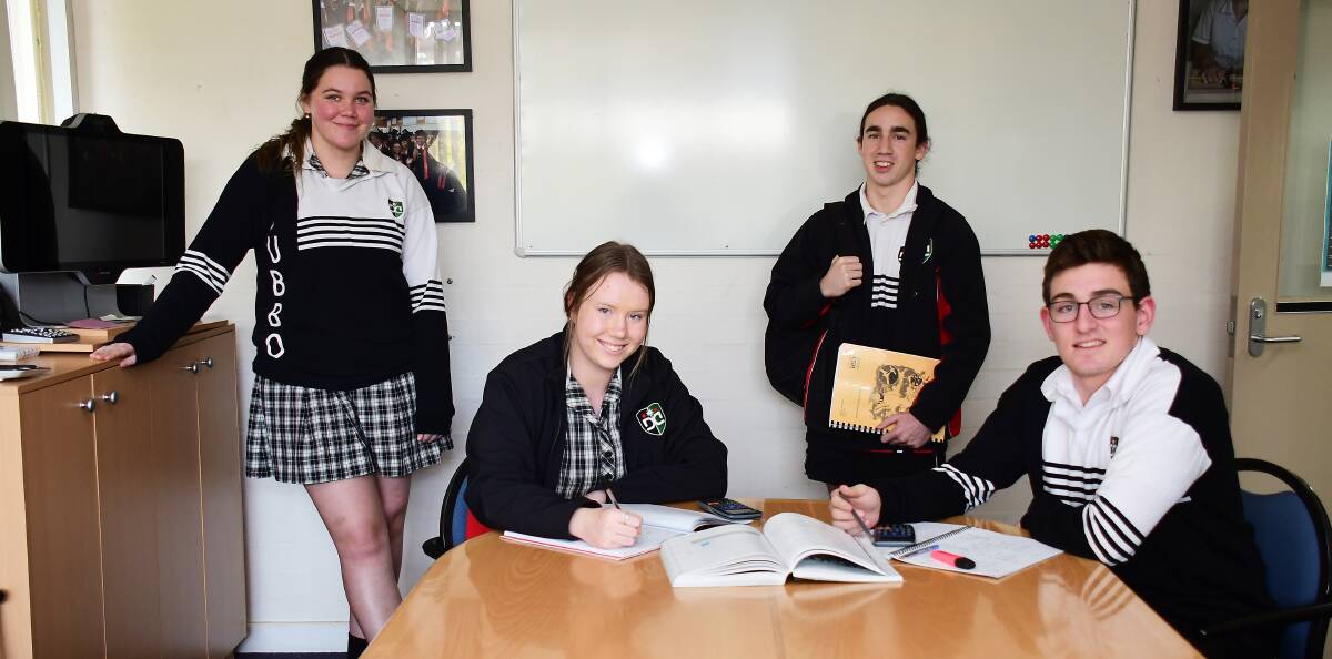 Studying: Dubbo College Senior Campus students Paycee Cubby, James Finch, Monique May and Darcy Wood. Photo: Belinda Soole. 