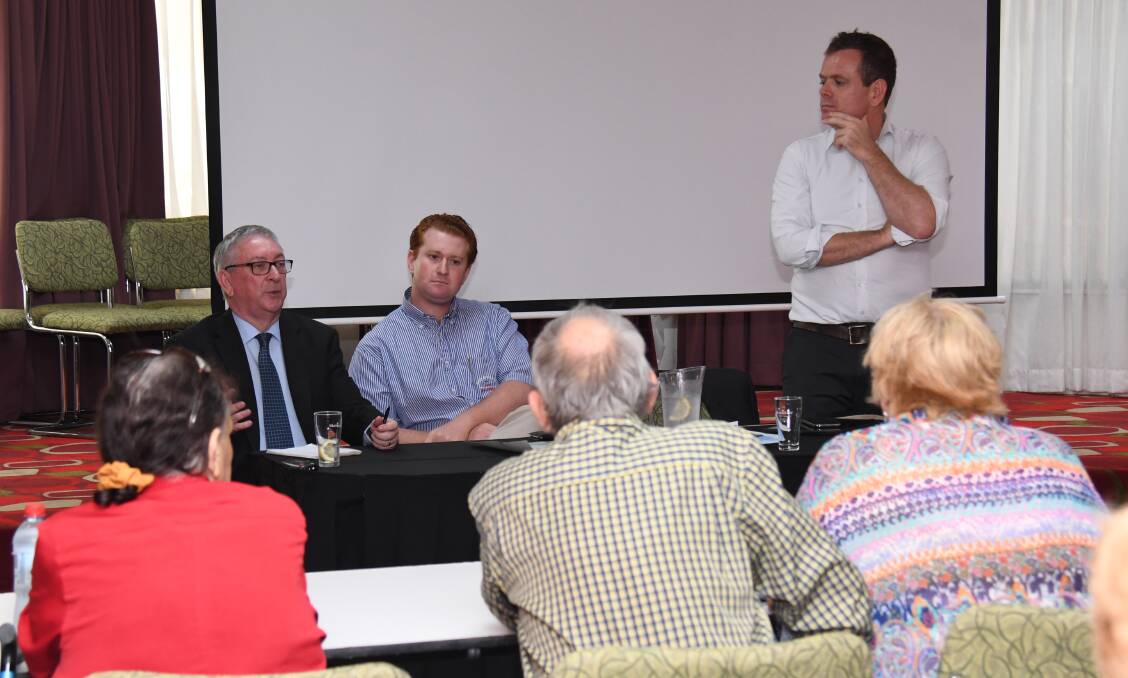 LISTENING: Shadow Minister for Regional Roads Peter Primrose, Labor candidate for Parkes Jack Ayoub and State Labor candidate Stephen Lawrence at the meeting. Photo: BELINDA SOOLE