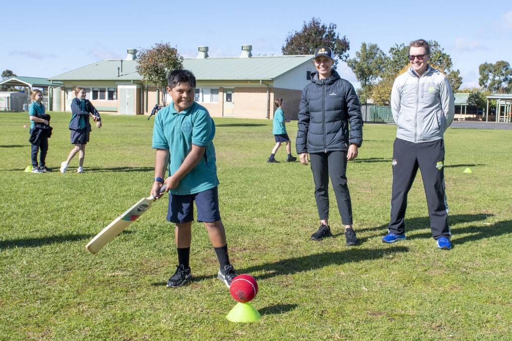 Orana Heights' Preston Naden looks to hit a ball under the watchful eyes of Ash Gardner and Cricket NSW's Matt Ellis. Picture by Belinda Soole