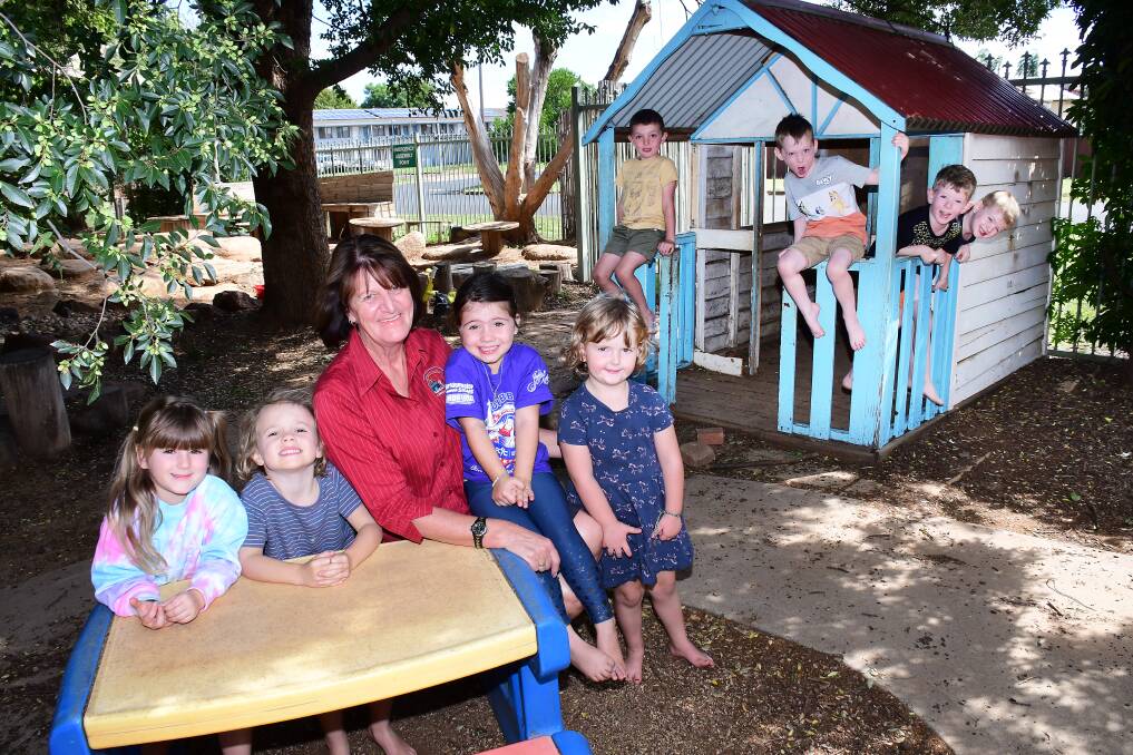 TWENTY-FIVE YEARS: Rainbow Cottage Childcare manager Ann Keen with some of the current children attending the childcare centre. Photo: BELINDA SOOLE.