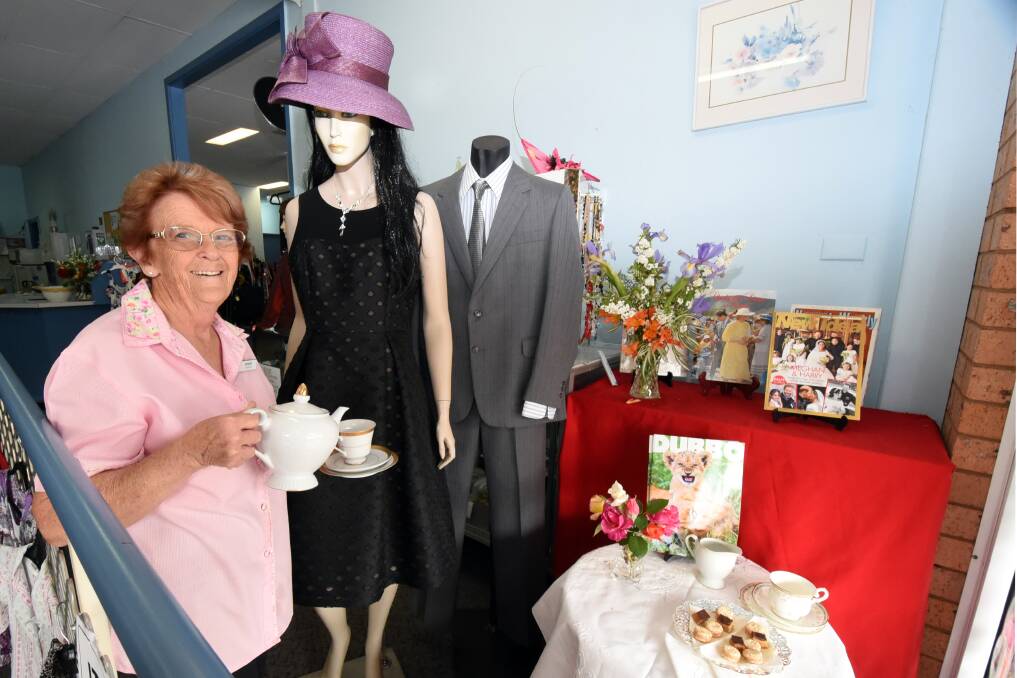 Royal fever: Lillimur Opportunity Shop Supervisor Robyn Fisher has made a display fit for Prince Harry and his new wife Meghan. Photo: Belinda Soole
