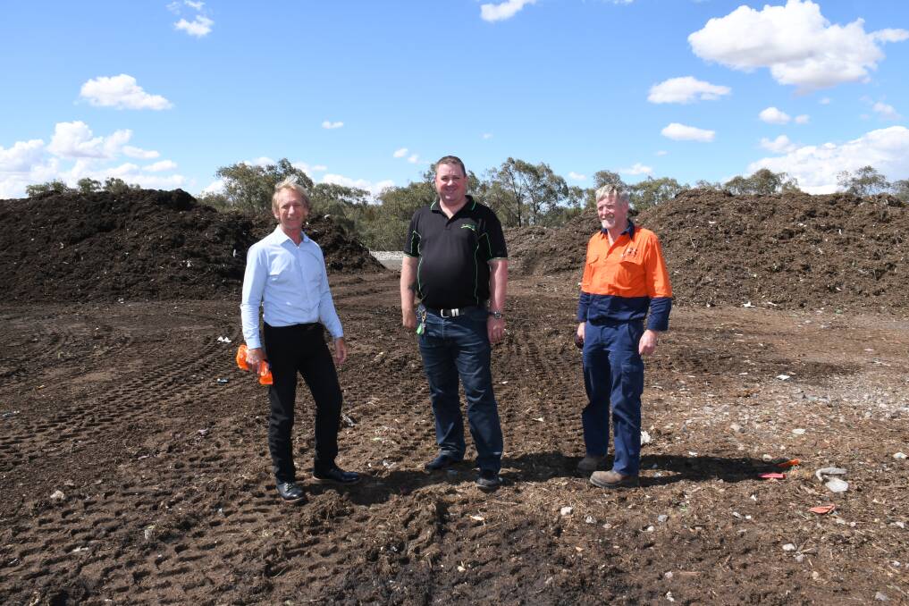 Dubbo Regional Council manager solid waste Mark Giebel, JR Richards regional manager Shane Fuller and Ken Matheson with the compost. Photo: BELINDA SOOLE