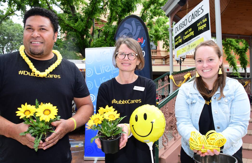 FIRST FOR DUBBO: Bruno Efoti, Kate Whiteley and Camilla Herbig at the Church Street rotunda on the inaugural Dubbo Cares Day on Wednesday. Photo: BELINDA SOOLE.