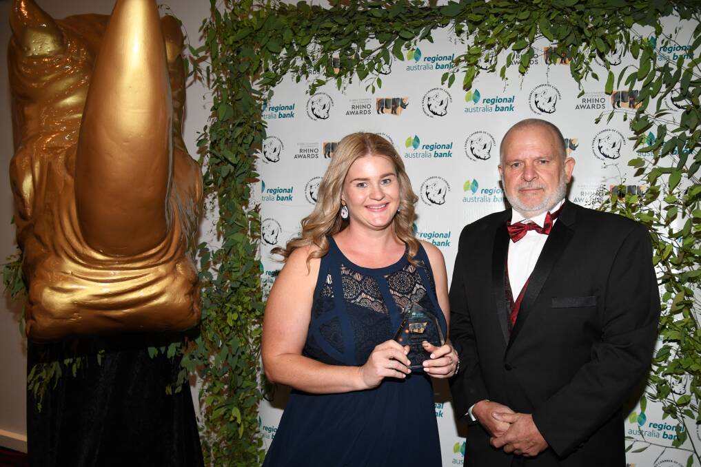 Star: My Tutor founder and director Emma Gersbach receives the Airlink Airlines Award for an Outstanding Young Business Leader from Airlink Airlines general manager Ron O'Brien. Picture: AMY MCINTYRE