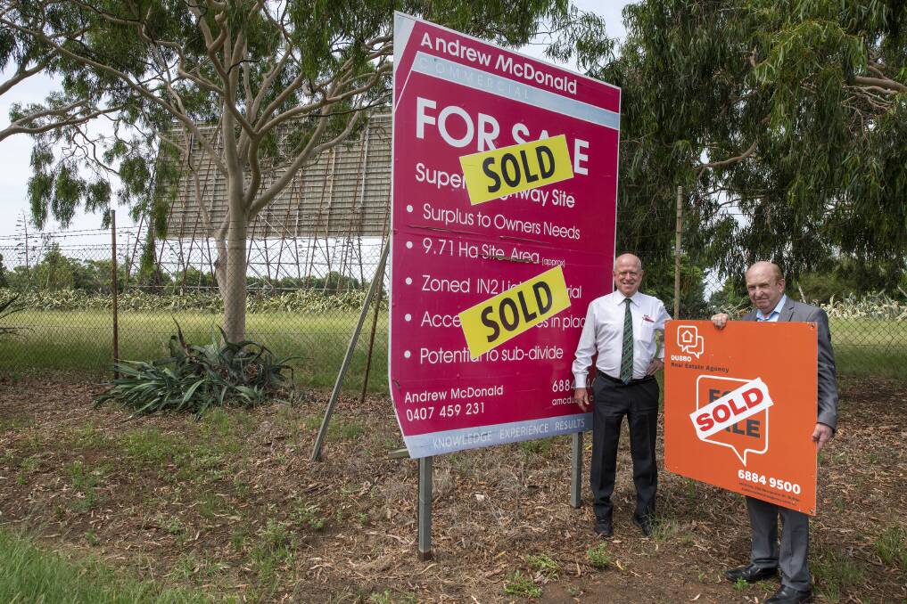 Sold: Joint selling agents Andrew McDonald of Andrew McDonald Commercial Dubbo and Mark Searle of Dubbo Real Estate Agency at the site. Picture: BELINDA SOOLE
