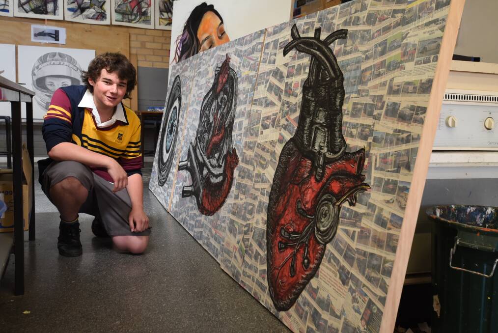 Personality: Year 12 Visual Art student Blake Browning with his pieces 'personification'. Photo: Belinda Soole