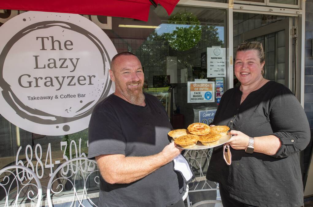 Back to business: The Lazy Grayzer owners Wayne and Monique Gray reopen the doors, ready to serve customers again. Picture: BELINDA SOOLE