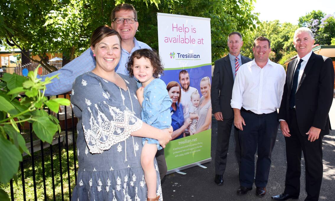 Extra support: Mum Simone O'Neill and daughter Milla (front) with Dubbo MP Troy Grant, Western NSW Local Health District chief Scott McLachlan, Nationals candidate Dugald Saunders and Tresillian CEO Robert Mills at the opening. Photo: BELINDA SOOLE