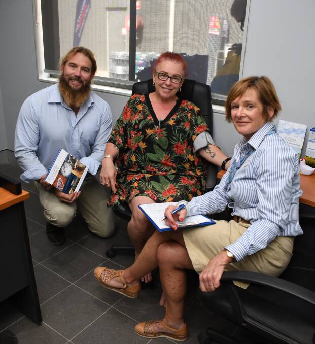 TESTS: Tony Fenwick, Kylie Tolmie and Morna Semmens come together at Metalcorp Dubbo which partnered with the National Centre for Farmer Health to offer free health checks for farmers on Friday. Photo: BELINDA SOOLE