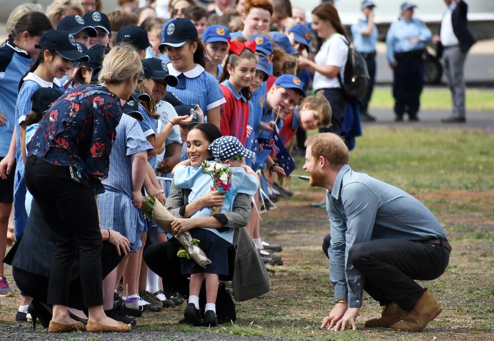 MAGIC: Daily Liberal photographer Belinda Soole is a finalist in the News Media Awards 2019 for capturing this magic moment when Prince Harry and his wife Meghan met Luke in Dubbo. Photo: BELINDA SOOLE